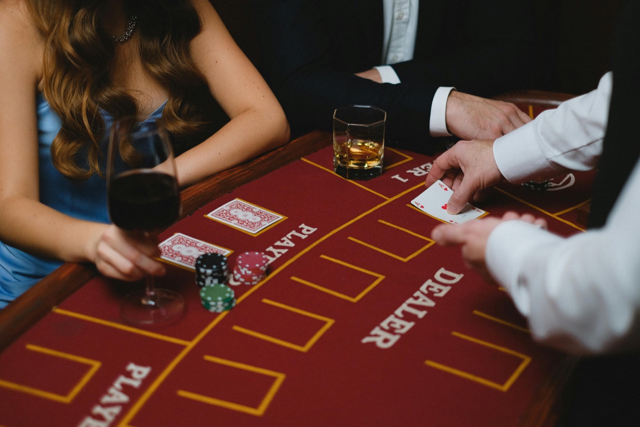 Dealer dealing cards at a blackjack table