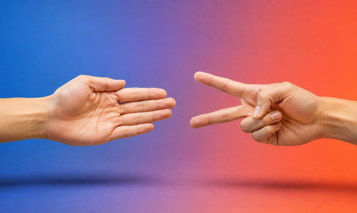 Two hands playing Rock Paper Scissors
