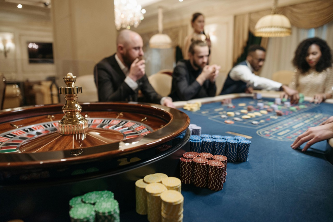 Roulette wheel and chips at a casino table